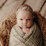 A Newborn Girl Mean Mugs During a Photoshoot, and Her Pics Might Be the Best Thing You’ll See Today_5e0cb9d43e832.jpeg